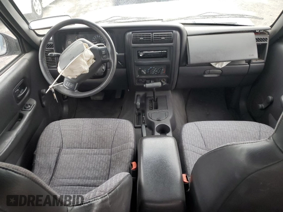 1999 Jeep Cherokee SE with VIN 1J4FF28S9XL576313, listed as a Copart auction lot 88470435 with Not provided miles and Salvage title. Bid and sale history available at DreamBid. Image 8.
