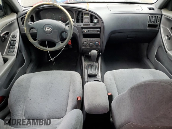 2004 Hyundai Elantra GLS z VIN KMHDN46D14U812275, wystawiony jako Copart lot #54163945 z przebiegiem 209 400 mil mil oraz Szkoda całkowita • Salvage title. Historia ofert i sprzedaży dostępna na DreamBid. Obrazek 8.