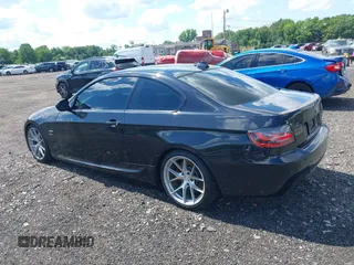 2011 BMW 3 Series 335i xDrive with VIN WBAKF9C56BE247125, listed as a IAAI auction lot 39738395 with 144,405 mi miles. Bid and sale history available at carsss.com. Image 3.