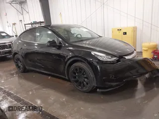 2021 Tesla Model Y Long Range with VIN 5YJYGAEE5MF305655, listed as a IAAI auction lot 41860993 with 50,750 mi miles. Bid and sale history available at carsss.com. Image 1.