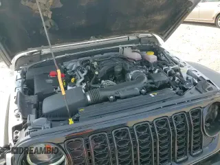 2024 Jeep Wrangler Willys with VIN 1C4PJXDG8RW250382, listed as a Copart auction lot 69934295 with 5,315 mi miles and Salvage title. Bid and sale history available at DreamBid. Image 14.