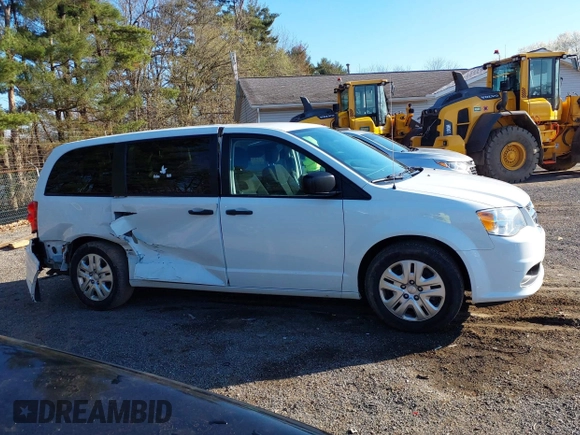 2019 Dodge Grand Caravan SE with VIN 2C4RDGBG2KR799660, listed as a IAAI auction lot 41898556 with 104,642 mi miles and . Bid and sale history available at DreamBid. Image 14.