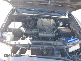 2021 Toyota Tacoma SR z VIN 3TYCZ5AN7MT017377, wystawiony jako IAAI lot #42285326 z przebiegiem 91 657 mil mil oraz . Historia ofert i sprzedaży dostępna na DreamBid. Obrazek 10.