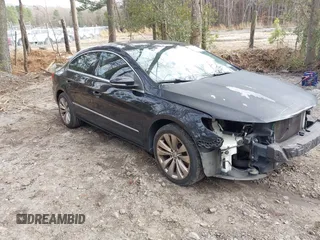 2012 Volkswagen CC Sport with VIN WVWMN7AN4CE519338, listed as a IAAI auction lot 41754760 with 153,208 mi miles. Bid and sale history available at carsss.com. Image 1.