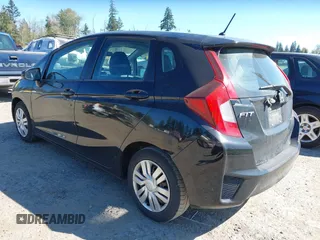 2015 Honda Fit LX with VIN 3HGGK5H58FM765907, listed as a IAAI auction lot 42061158 with 120,178 mi miles. Bid and sale history available at carsss.com. Image 3.