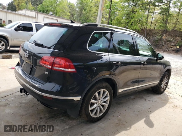 2016 Volkswagen Touareg Sport with VIN WVGEF9BP3GD007543, listed as a Copart auction lot 52806715 with 121,404 mi miles and Salvage Title. Bid and sale history available at DreamBid. Image 3.