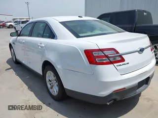 2015 Ford Taurus SE with VIN 1FAHP2D8XFG105029, listed as a IAAI auction lot 42068632 with 164,098 mi miles and . Bid and sale history available at carsss.com. Image 6.
