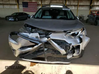 2018 Toyota RAV4 XLE with VIN JTMRFREV1JJ213808, listed as a Copart auction lot 54437805 with 56,972 mi miles and Salvage Title. Bid and sale history available at DreamBid. Image 5.