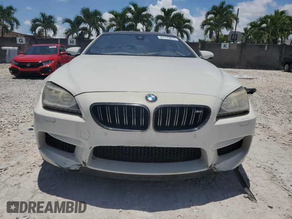 2014 BMW M6 with VIN WBS6C9C55ED467226, listed as a Copart auction lot 61779015 with Not provided miles and Salvage title. Bid and sale history available at DreamBid. Image 5.