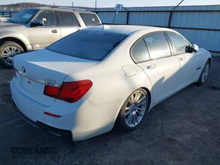 2013 BMW 7 Series 740i with VIN WBAYA6C54DD143796, listed as a IAAI auction lot 41433835 with 1 mi miles. Bid and sale history available at carsss.com. Image 4.