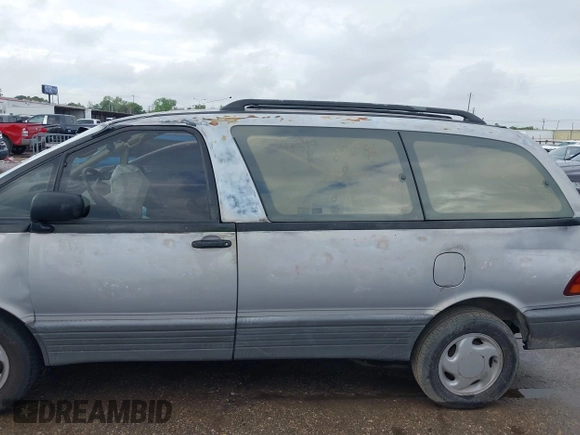 1997 Toyota Previa z VIN JT3GK12M0V1247510, wystawiony jako IAAI lot #41911370 z przebiegiem 218 832 mil mil oraz . Historia ofert i sprzedaży dostępna na DreamBid. Obrazek 14.