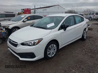 2021 Subaru Impreza with VIN 4S3GKAB61M3605939, listed as a IAAI auction lot 41125198 with 42,168 mi miles. Bid and sale history available at carsss.com. Image 2.