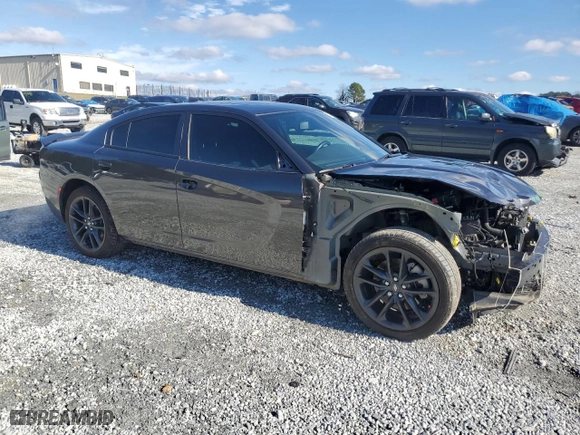 2023 Dodge Charger SXT with VIN 2C3CDXJG6PH675710, listed as a Copart auction lot 85317954 with 12,034 mi miles and Salvage Title. Bid and sale history available at carsss.com. Image 4.