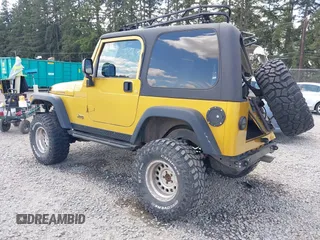 2003 Jeep Wrangler Rubicon with VIN 1J4FA69S93P302102, listed as a IAAI auction lot 42312951 with 146,408 mi miles and . Bid and sale history available at DreamBid. Image 3.