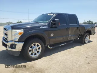 2015 Ford F-250 Lariat z VIN 1FT7W2BT0FED68030, wystawiony jako Copart lot #59409115 z przebiegiem 221 130 mil mil oraz Szkoda całkowita • Salvage title. Historia ofert i sprzedaży dostępna na DreamBid. Obrazek 1.