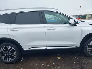 2019 Hyundai Santa Fe Limited z VIN 5NMS5CAA4KH040376, wystawiony jako IAAI lot #42192813 z przebiegiem 33 464 mil mil oraz . Historia ofert i sprzedaży dostępna na DreamBid. Obrazek 14.
