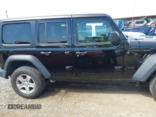 2023 Jeep Wrangler Sport S with VIN 1C4HJXDN6PW599895, listed as a IAAI auction lot 42242107 with 53,980 mi miles and . Bid and sale history available at DreamBid. Image 13.