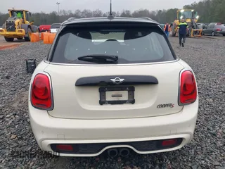 2016 MINI Cooper Hardtop 4 Door S with VIN WMWXU3C52G2D30121, listed as a IAAI auction lot 41521841 with 82,334 mi miles. Bid and sale history available at carsss.com. Image 17.