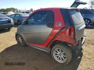 2014 Smart fortwo Passion z VIN WMEEJ9AA6EK792201, wystawiony jako Copart lot #74756574 z przebiegiem 17 282 mil mil oraz Szkody całkowita. Historia ofert i sprzedaży dostępna na DreamBid. Obrazek 2.
