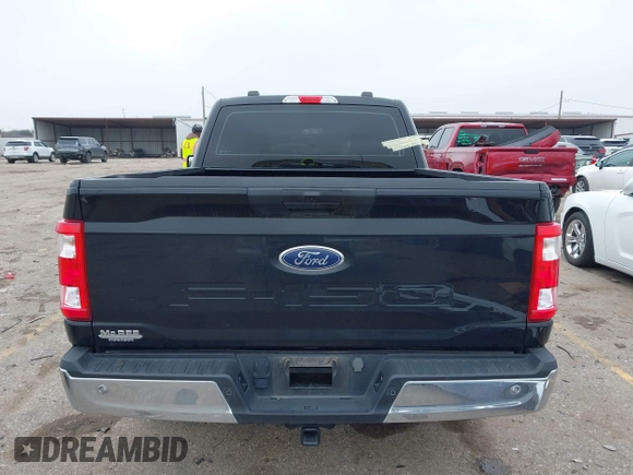 2023 Ford F-150 XL with VIN 1FTMF1C50PKE33412, listed as a IAAI auction lot 41391359 with 19,344 mi miles and . Bid and sale history available at carsss.com. Image 17.