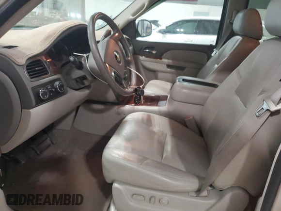 2010 Chevrolet Tahoe LTZ with VIN 1GNUKCE02AR274147, listed as a Copart auction lot 54667545 with 210,207 mi miles and Salvage title. Bid and sale history available at DreamBid. Image 7.