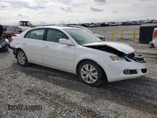 2010 Toyota Avalon XL with VIN 4T1BK3DB1AU367110, listed as a Copart auction lot 53719905 with 187,214 mi miles and Salvage Title. Bid and sale history available at DreamBid. Image 4.
