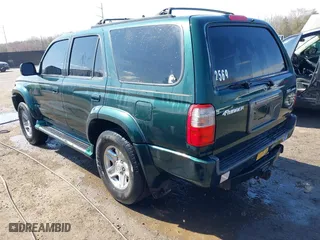 2000 Toyota 4Runner SR5 with VIN JT3HN86R1Y0323093, listed as a IAAI auction lot 41769405 with 156,905 mi miles. Bid and sale history available at carsss.com. Image 3.