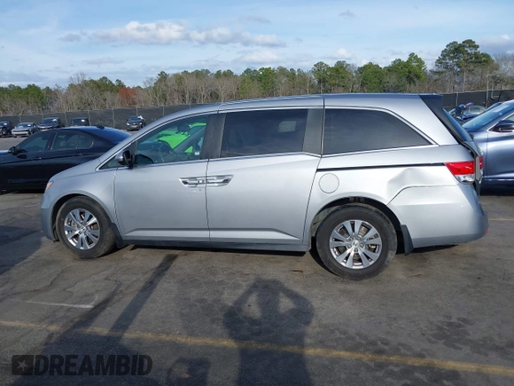 2017 Honda Odyssey EX-L with VIN 5FNRL5H64HB017661, listed as a IAAI auction lot 41719447 with 99,895 mi miles and . Bid and sale history available at DreamBid. Image 14.