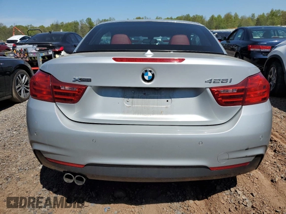 2014 BMW 4 Series 428i xDrive with VIN WBA3T1C58EP819710, listed as a Copart auction lot 54699235 with 196,856 mi miles and Salvage Title. Bid and sale history available at carsss.com. Image 6.