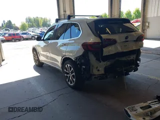 2022 BMW X5 xDrive40i with VIN 5UXCR6C09N9M21945, listed as a IAAI auction lot 42170363 with 23,537 mi miles and . Bid and sale history available at DreamBid. Image 3.