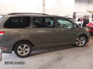 2011 Toyota Sienna LE AAS with VIN 5TDKK3DC1BS073077, listed as a IAAI auction lot 41916750 with 176,822 mi miles. Bid and sale history available at carsss.com. Image 12.