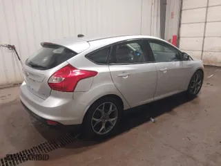 2014 Ford Focus SE with VIN 1FADP3K27EL258850, listed as a IAAI auction lot 40818354 with 106,249 mi miles. Bid and sale history available at carsss.com. Image 4.