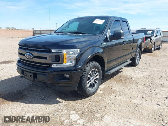 2018 Ford F-150 XL with VIN 1FTEX1EP7JFC21008, listed as a IAAI auction lot 42072145 with 102,679 mi miles and . Bid and sale history available at DreamBid. Image 17.