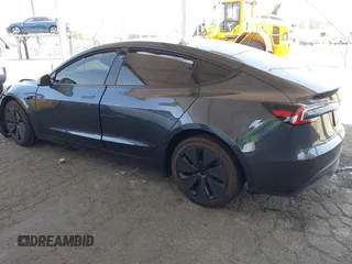 2025 Tesla Model 3 Long Range with VIN 5YJ3E1EA5SF978214, listed as a IAAI auction lot 42525444 with 6,489 mi miles and . Bid and sale history available at DreamBid. Image 3.