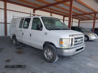 2014 Ford Econoline Cargo Commercial with VIN 1FTNE2EW3EDA31341, listed as a IAAI auction lot 42148317 with 146,158 mi miles. Bid and sale history available at carsss.com. Image 1.