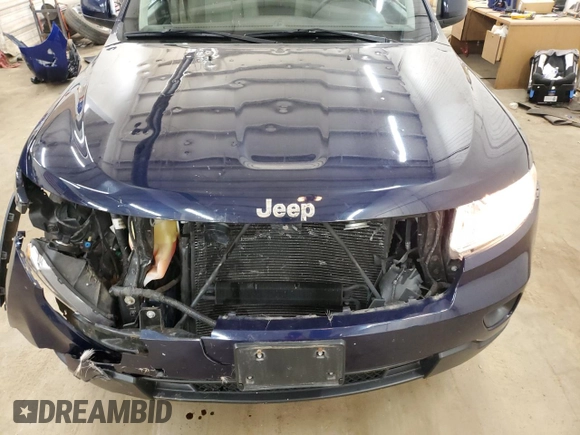 2012 Jeep Grand Cherokee Laredo with VIN 1C4RJFAG9CC221229, listed as a Copart auction lot 52035545 with 70,332 mi miles and Salvage Title. Bid and sale history available at carsss.com. Image 12.