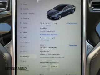 2014 Tesla Model S 60 z VIN 5YJSA1H17EFP36595, wystawiony jako Copart lot #53705035 z przebiegiem 148 254 mil mil oraz Szkoda całkowita • Salvage title. Historia ofert i sprzedaży dostępna na DreamBid. Obrazek 9.