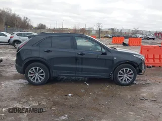 2021 Cadillac XT4 AWD Sport with VIN 1GYFZFR49MF065225, listed as a IAAI auction lot 41191994 with 58,095 mi miles and . Bid and sale history available at DreamBid. Image 13.