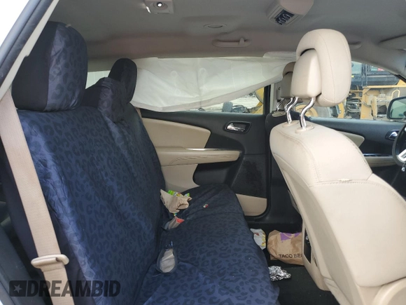 2012 Dodge Journey SXT with VIN 3C4PDCBG5CT135724, listed as a Copart auction lot 56938415 with 180,548 mi miles and Salvage title. Bid and sale history available at DreamBid. Image 11.