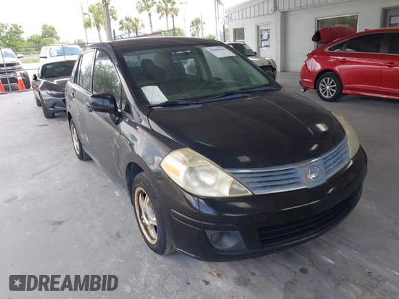 2009 Nissan Versa 1.8 S with VIN 3N1BC11E79L368680, listed as a IAAI auction lot 42090230 with 190,049 mi miles. Bid and sale history available at carsss.com. Image 6.