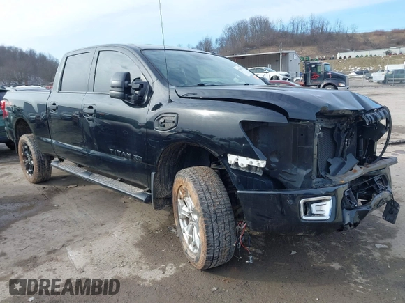 2018 Nissan Titan XD SV with VIN 1N6BA1F49JN521838, listed as a IAAI auction lot 41606878 with 143,742 mi miles. Bid and sale history available at carsss.com. Image 1.