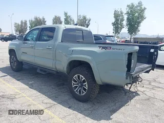 2022 Toyota Tacoma SR5 with VIN 3TMBZ5DN1NM035572, listed as a IAAI auction lot 42083925 with 82,596 mi miles and . Bid and sale history available at DreamBid. Image 3.