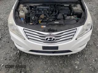 2013 Hyundai Azera z VIN KMHFH4JG2DA277122, wystawiony jako Copart lot #59899755 z przebiegiem 210 601 mil mil oraz Czysty tytuł • Clean title. Historia ofert i sprzedaży dostępna na DreamBid. Obrazek 11.