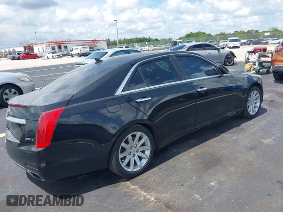 2014 Cadillac CTS RWD with VIN 1G6AP5SX0E0185913, listed as a IAAI auction lot 42685622 with 107,406 mi miles and . Bid and sale history available at DreamBid. Image 4.