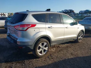 2015 Ford Escape SE with VIN 1FMCU0G95FUA44739, listed as a IAAI auction lot 42030903 with 182,826 mi miles. Bid and sale history available at carsss.com. Image 4.