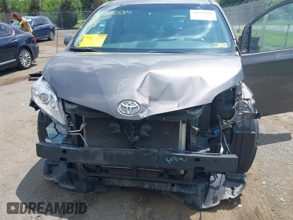 2014 Toyota Sienna LE AAS with VIN 5TDKK3DC3ES435091, listed as a IAAI auction lot 42735534 with 150,132 mi miles and . Bid and sale history available at DreamBid. Image 6.