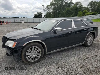 2012 Chrysler 300 C with VIN 2C3CCAKTXCH151465, listed as a Copart auction lot 65820264 with 132,609 mi miles and Salvage Title. Bid and sale history available at DreamBid. Image 1.