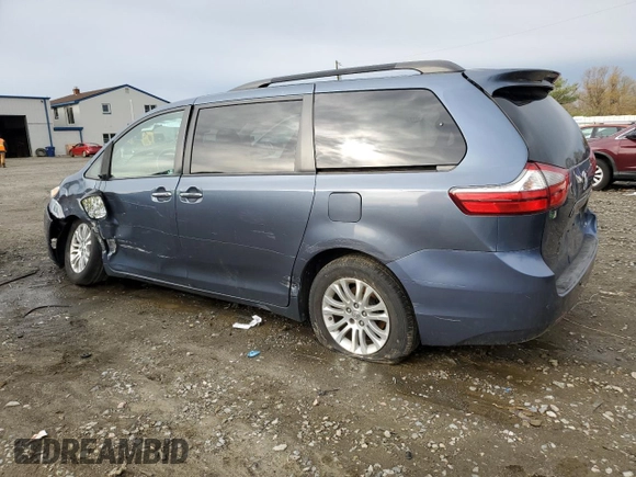 2015 Toyota Sienna XLE with VIN 5TDYK3DC4FS643475, listed as a Copart auction lot 52697405 with 153,808 mi miles and Salvage Title. Bid and sale history available at DreamBid. Image 2.