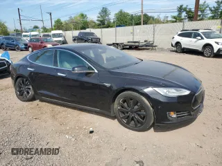 2016 Tesla Model S 90D with VIN 5YJSA1E28GF131212, listed as a Copart auction lot 54176705 with 97,373 mi miles and Salvage Title. Bid and sale history available at DreamBid. Image 4.