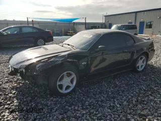 2000 Ford Mustang GT z VIN 1FAFP42X1YF247064, wystawiony jako Copart lot #56169385 z przebiegiem 29 845 mil mil oraz Szkoda całkowita • Salvage title. Historia ofert i sprzedaży dostępna na DreamBid. Obrazek 1.